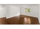 Living room with hardwood floors and a large window that brightens the space at 3510 Roswell Nw Rd # N3, Atlanta, GA 30305