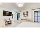 Modern bedroom with hardwood floors and an open view to the outdoors at 6090 River Chase Cir, Atlanta, GA 30328