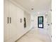 Hallway with built-in storage cabinets and a bench at 6090 River Chase Cir, Atlanta, GA 30328