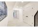 Hallway featuring artwork, interior doors, and staircase at 6090 River Chase Cir, Atlanta, GA 30328