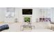 Elegant living room with fireplace, built-in shelving, and stylish decor at 6090 River Chase Cir, Atlanta, GA 30328