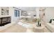 Open-concept living space with fireplace, desk, and view into bathroom at 6090 River Chase Cir, Atlanta, GA 30328