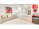 Inviting living room with cozy seating, modern art, and a unique Coca-Cola themed refrigerator enhancing the room's character at 6090 River Chase Cir, Atlanta, GA 30328