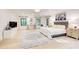 Spacious main bedroom features natural light, hardwood floors and modern furniture at 6090 River Chase Cir, Atlanta, GA 30328