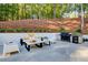 Well-equipped outdoor kitchen featuring a grill and beverage center, ideal for outdoor cooking at 6090 River Chase Cir, Atlanta, GA 30328