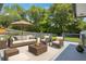 Spacious outdoor deck with comfortable seating and an umbrella, perfect for relaxing and entertaining guests at 3089 Ranlo Dr, Atlanta, GA 30340