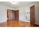 Spacious bedroom with gleaming hardwood floors, ample closet space, and ensuite bathroom at 3089 Ranlo Dr, Atlanta, GA 30340