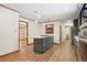 Bright and spacious kitchen featuring a large island, stainless steel appliances, and seamless access to adjacent rooms at 3089 Ranlo Dr, Atlanta, GA 30340