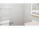 Bathroom featuring a toilet, vanity, and mirror at 3406 Blackberry Ln, Villa Rica, GA 30180