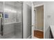 Bathroom featuring a glass door shower and a doorway to the rest of the house at 4648 Danna Dr, Austell, GA 30106