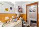Bright bathroom with tiled walls, decorative accents, and ample counter space at 4648 Danna Dr, Austell, GA 30106