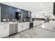 Modern kitchen features white cabinets, stainless steel appliances, and subway tile backsplash at 4648 Danna Dr, Austell, GA 30106