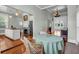 Eat in kitchen with hardwood floors and a view of the entry foyer at 205 Cobb St, Palmetto, GA 30268