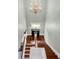 Staircase with hardwood stairs and white painted risers at 205 Cobb St, Palmetto, GA 30268