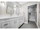 Beautiful bathroom features a double vanity and tiled shower at 4971 Fairhaven Ne Way, Roswell, GA 30075
