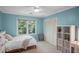 Bright bedroom with a full size bed, closet, and natural light at 4971 Fairhaven Ne Way, Roswell, GA 30075