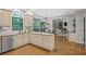 Open-concept kitchen with stainless steel appliances, and an eat-in area at 4971 Fairhaven Ne Way, Roswell, GA 30075