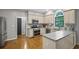 Well-equipped kitchen with stainless steel appliances and ample counter space at 4971 Fairhaven Ne Way, Roswell, GA 30075