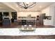 Spacious kitchen boasts white cabinets, stainless steel appliances, and a large island with seating at 5714 Pickens Garden Ln, Powder Springs, GA 30127