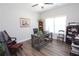 Office space with natural light, hardwood floors, neutral walls, desk, chair, and decorative decor at 5714 Pickens Garden Ln, Powder Springs, GA 30127