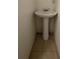 Small bathroom featuring a pedestal sink at 8436 Magnolia Dr, Jonesboro, GA 30238