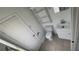 Bright bathroom featuring toilet, sink with vanity, and shelving at 8436 Magnolia Dr, Jonesboro, GA 30238