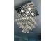 Close-up of a modern chandelier at 8436 Magnolia Dr, Jonesboro, GA 30238