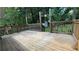 Spacious wooden deck overlooking the backyard, perfect for outdoor entertaining at 8436 Magnolia Dr, Jonesboro, GA 30238