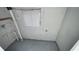 Utility room with concrete floor and exposed pipes at 8436 Magnolia Dr, Jonesboro, GA 30238