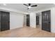 Bright basement features a sleek fan, new windows, and neutral paint at 1409 Georgia Ave, East Point, GA 30344