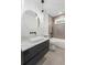 Bathroom featuring modern fixtures, shower over bath and vessel sink at 1409 Georgia Ave, East Point, GA 30344