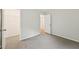 Bedroom with two closets and an open closet, showing neutral carpet and walls at 231 Silver Fox Trl, Dallas, GA 30157