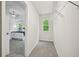 This walk-in closet offers ample storage space with neutral walls and carpeted floor at 231 Silver Fox Trl, Dallas, GA 30157