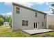 Exterior view of a two-story home with a patio and backyard at 231 Silver Fox Trl, Dallas, GA 30157