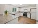 Well-lit kitchen featuring granite countertops and stainless steel appliances at 231 Silver Fox Trl, Dallas, GA 30157