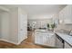 Open kitchen with island and stainless steel dishwasher at 231 Silver Fox Trl, Dallas, GA 30157