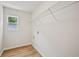 Laundry room features a window for natural light and wire shelving for storage at 231 Silver Fox Trl, Dallas, GA 30157