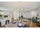 Bright and airy living space with an open floor plan and a view into the kitchen at 231 Silver Fox Trl, Dallas, GA 30157