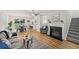 Inviting living area with a fireplace, hardwood floors, and plenty of natural light at 231 Silver Fox Trl, Dallas, GA 30157
