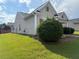 Well-maintained home with a green lawn and meticulous landscaping at 2979 Dungeness Dr, Douglasville, GA 30135