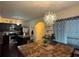 Modern kitchen featuring stainless steel appliances, a center island, and stylish pendant lighting at 2979 Dungeness Dr, Douglasville, GA 30135