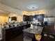 Spacious kitchen with stainless appliances, granite countertops, and ample cabinet space at 2979 Dungeness Dr, Douglasville, GA 30135