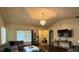 Spacious living room featuring vaulted ceilings, a large sectional sofa, and contemporary furnishings at 2979 Dungeness Dr, Douglasville, GA 30135