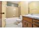 This bathroom has a sink, toilet, tub, and shower combo at 338 Patterson Rd, Lawrenceville, GA 30044