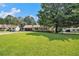 Single story home with a large front yard and covered carport, offering ample parking space at 338 Patterson Rd, Lawrenceville, GA 30044