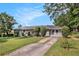Charming one-story home featuring a well-maintained front yard and a classic, welcoming facade at 41 Elder St, Fairburn, GA 30213