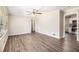 Spacious living room featuring hardwood floors, bright natural light, and neutral paint at 41 Elder St, Fairburn, GA 30213