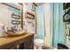 Charming bathroom features a vessel sink and decorative fixtures at 1198 Old Mill Rd, Dallas, GA 30157