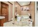 An interior bathroom with a bathtub at 1198 Old Mill Rd, Dallas, GA 30157