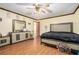 Bedroom with hardwood floors, ceiling fan, and natural light at 1198 Old Mill Rd, Dallas, GA 30157